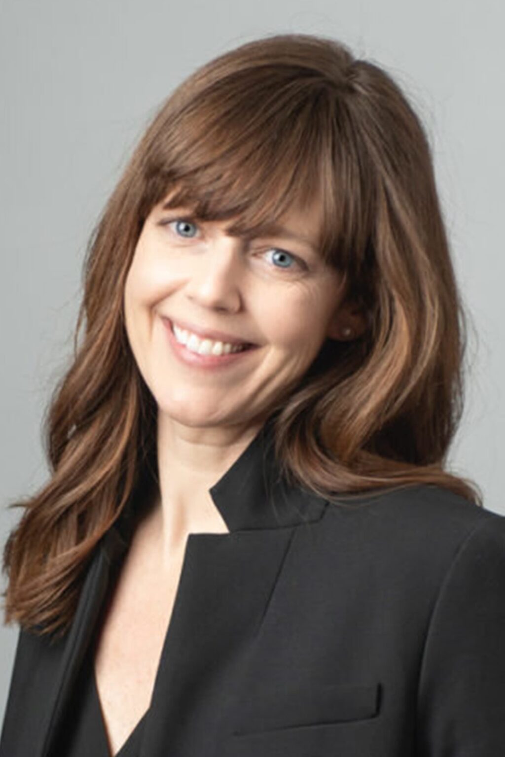 A headshot of Alice Brooks.