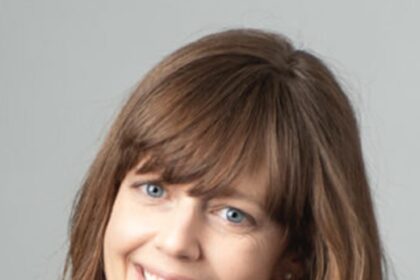 A headshot of Alice Brooks.