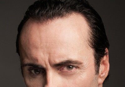 A headshot of Darren Moore.