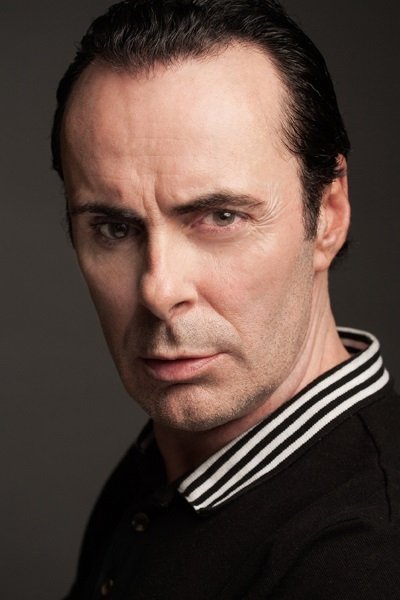 A headshot of Darren Moore.