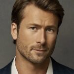 A headshot of Glen Powell.