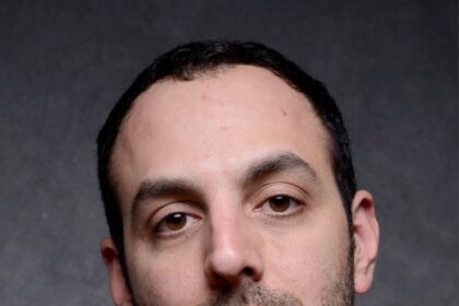 A headshot of Chris Galletta.