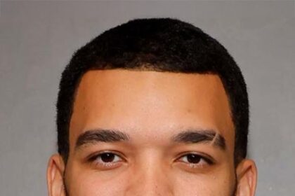 A headshot of Justice Smith.