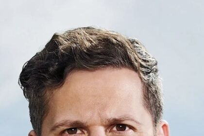 A headshot of Andy Samberg.