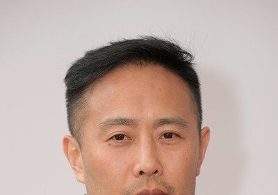 A headshot of Eddie Yu.