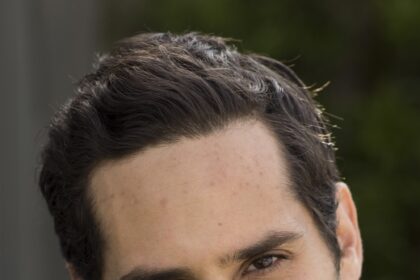 A headshot of Doug Mand.