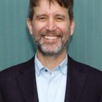 A headshot of Rhett Reese.