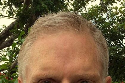 A headshot of Todd Hallowell.