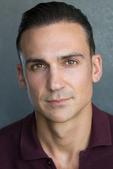 A headshot of Henry Lloyd-Hughes.