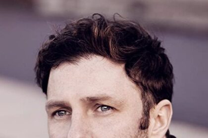 A headshot of Steven Cree.