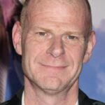 A headshot of Tom Holkenborg.