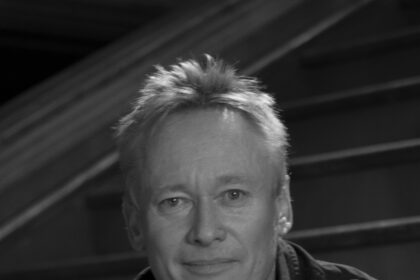 A headshot of Simon Duggan.