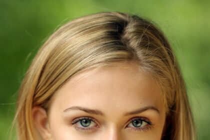 A headshot of Sophie Simnett.