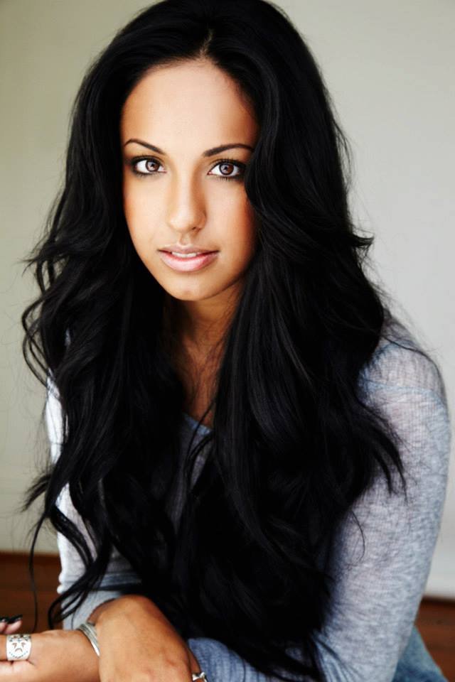 A headshot of Yasmin Kassim.