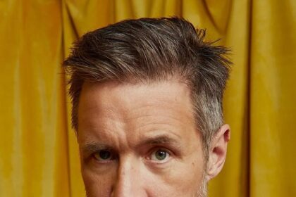 A headshot of Paddy Considine.