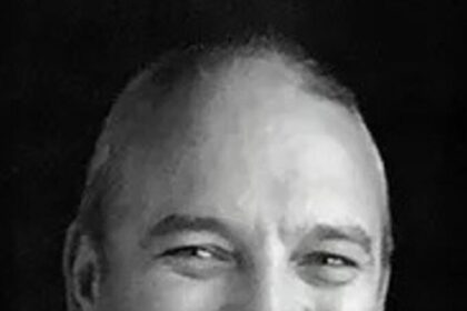 A headshot of Dean Hood.