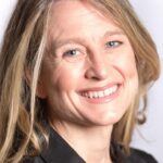 A headshot of Nikki Barrett.