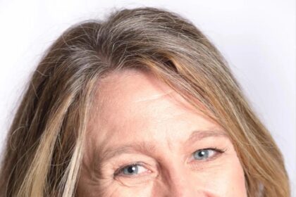 A headshot of Nikki Barrett.