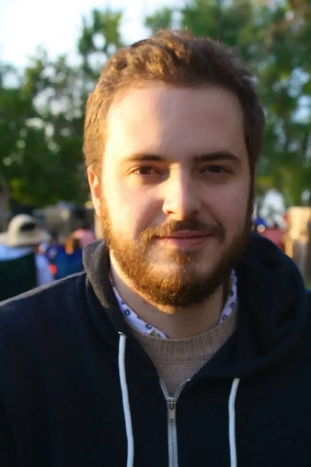 A headshot of Harrison Query.