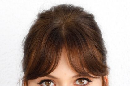 A headshot of Emilia Jones.