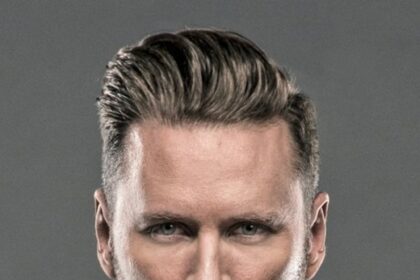 A headshot of Brian Tyler.