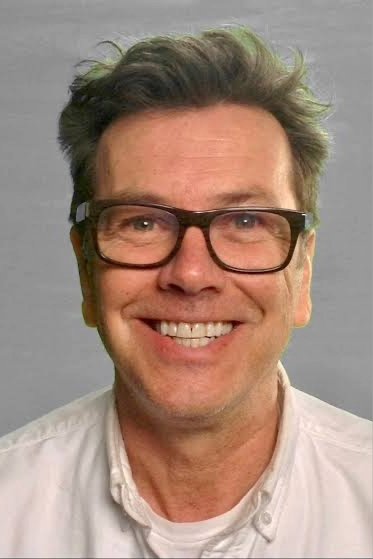 A headshot of Kevin Thompson.