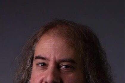 A headshot of Paul Machliss.