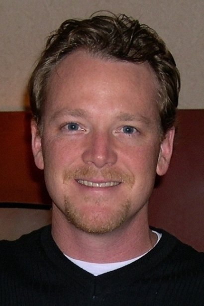 A headshot of Robert Duncan McNeill.