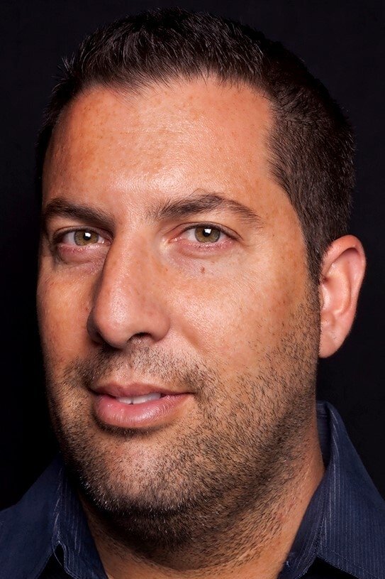 A headshot of Christopher Lennertz.