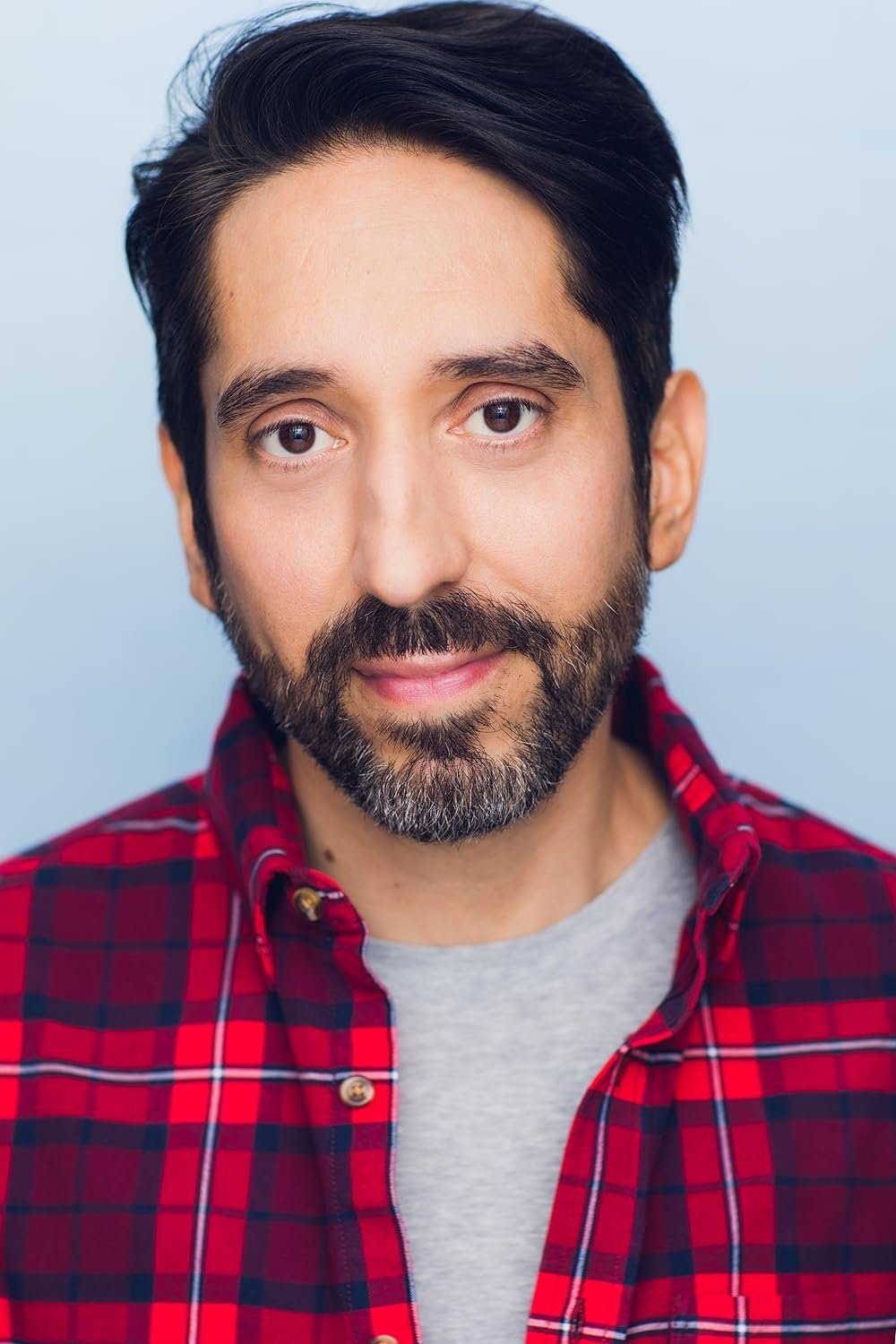 A headshot of Rodrigo Luzzi.