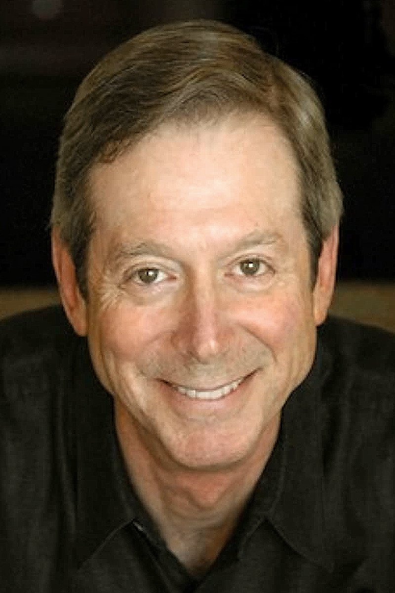 A headshot of James L. Conway.