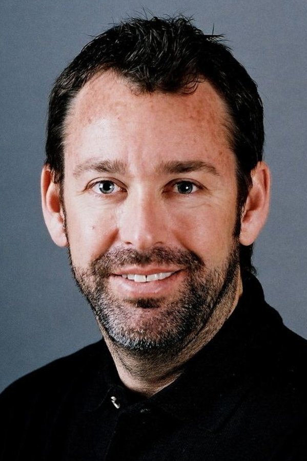 A headshot of David Barrett.