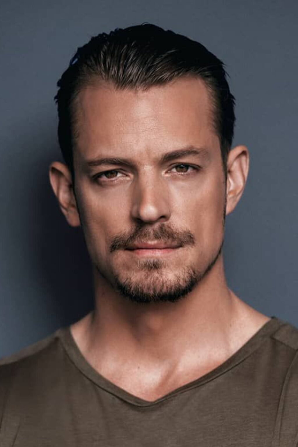 Official headshot photo of person: Joel Kinnaman.