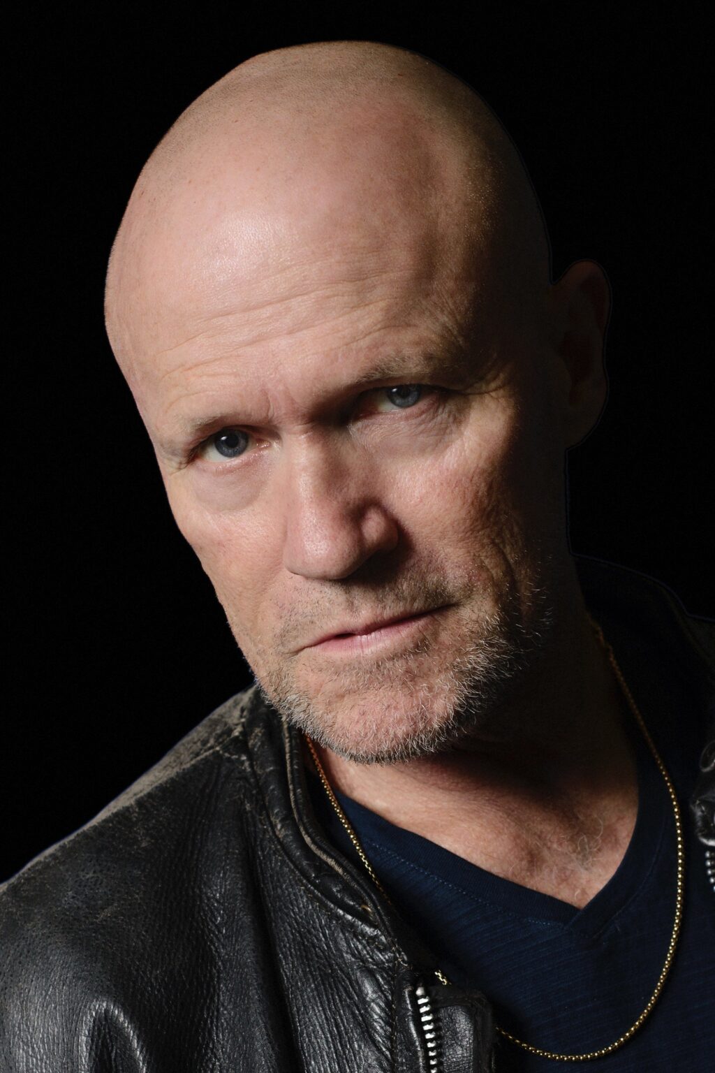 Official headshot photo of person: Michael Rooker.