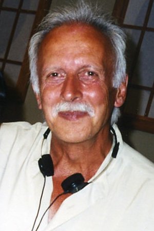 A headshot of Tony Wharmby.