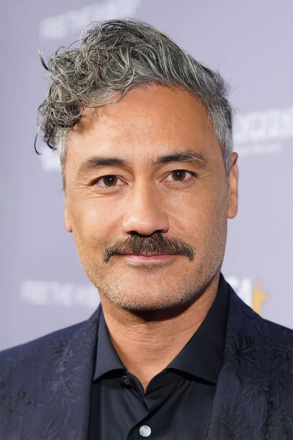 Official headshot photo of person: Taika Waititi.